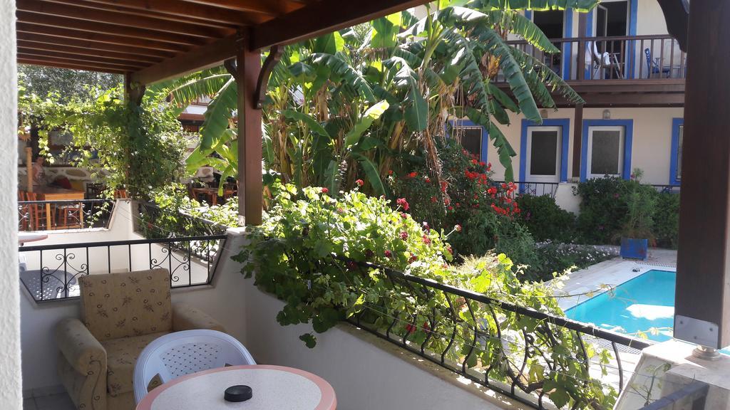 Paradise Garden Gumusluk Evleri Aparthotel Стая снимка