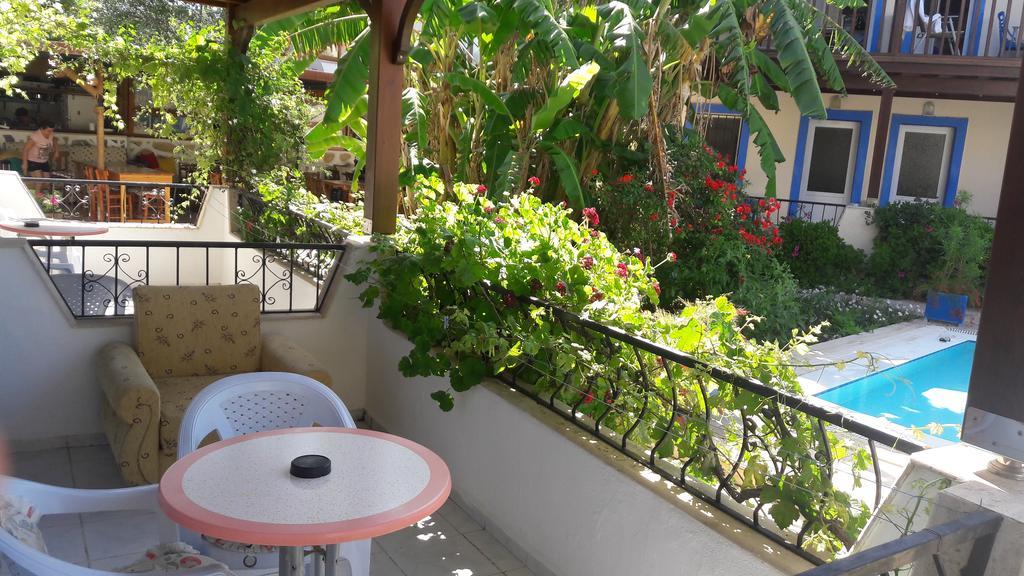 Paradise Garden Gumusluk Evleri Aparthotel Стая снимка